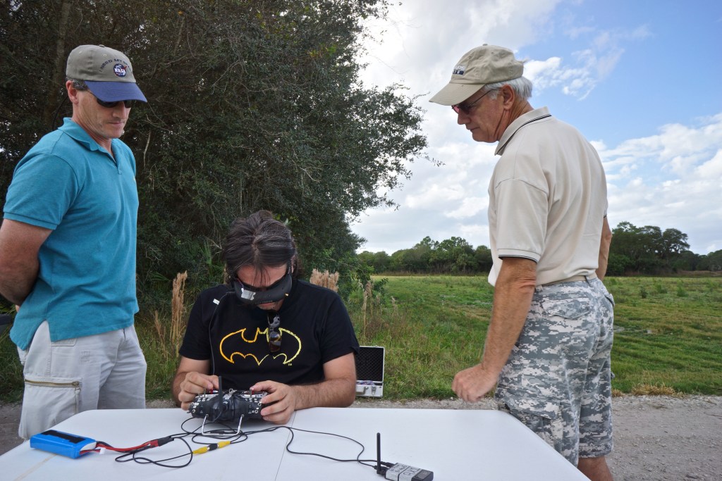 Kike Calvo learning to pilot a small unmanned aircraft using first-person-view (FPV) technology during a training course at Unmanned Vehicle University in November 2013.