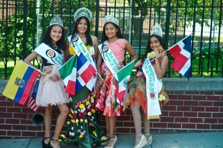 Four young parade queens celebrating Feria de las Flores in Jackson Heights, Queens, New York, photographed by Kike Calvo.